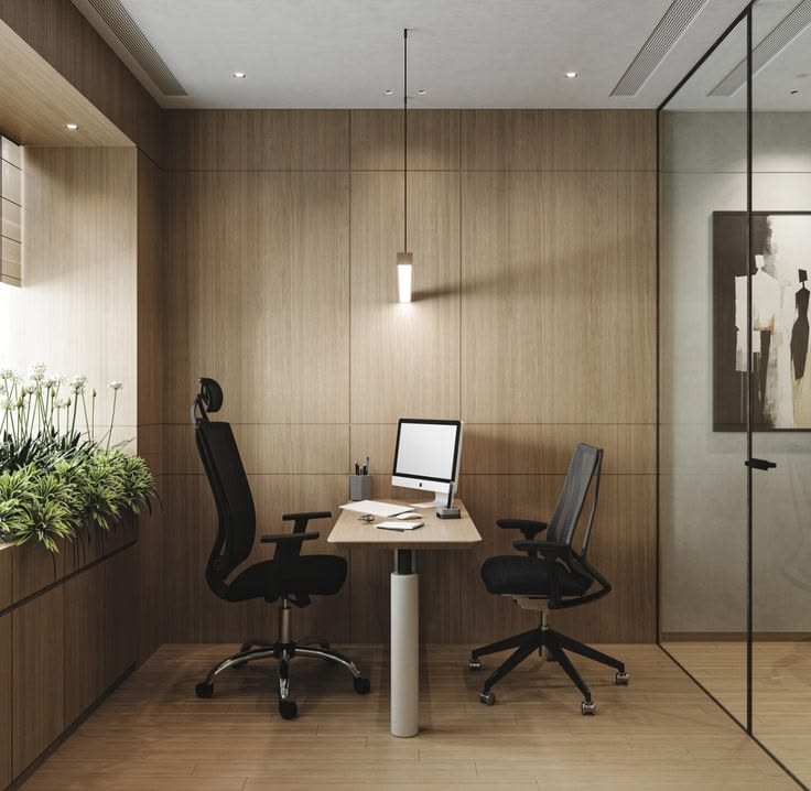 Modern workspace with planned furniture placement and natural lighting